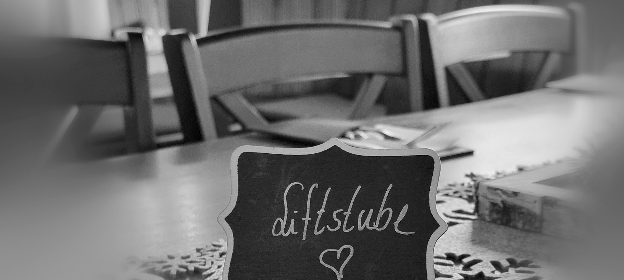 Dekoschild Liftstube schwarz weiß